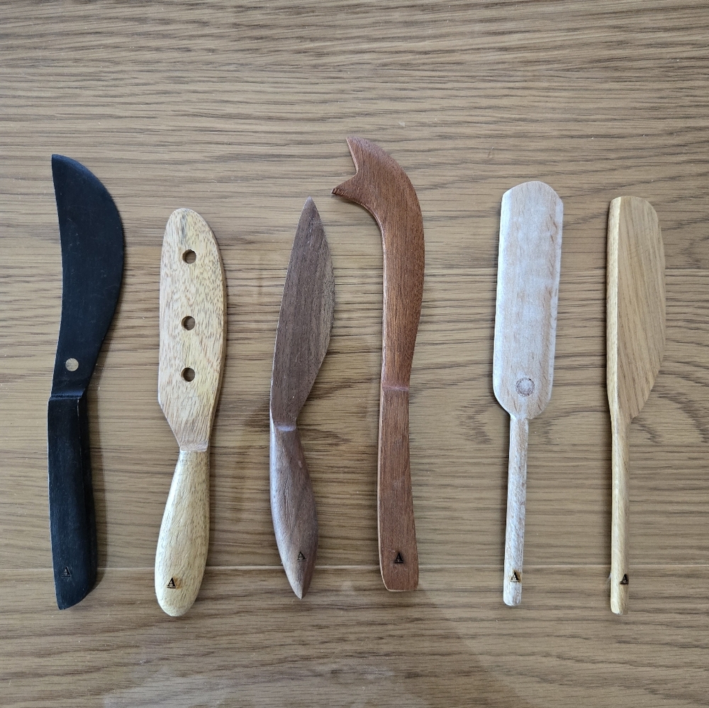 Anthopologie Wooden Cheese Knives Set.